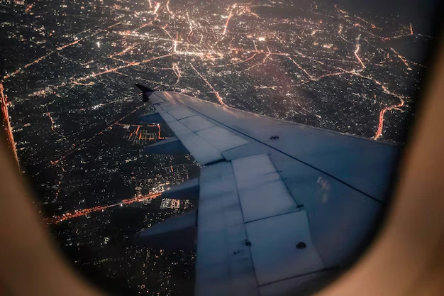 Vista desde la ventanilla de un avión al aterrizar en Madrid